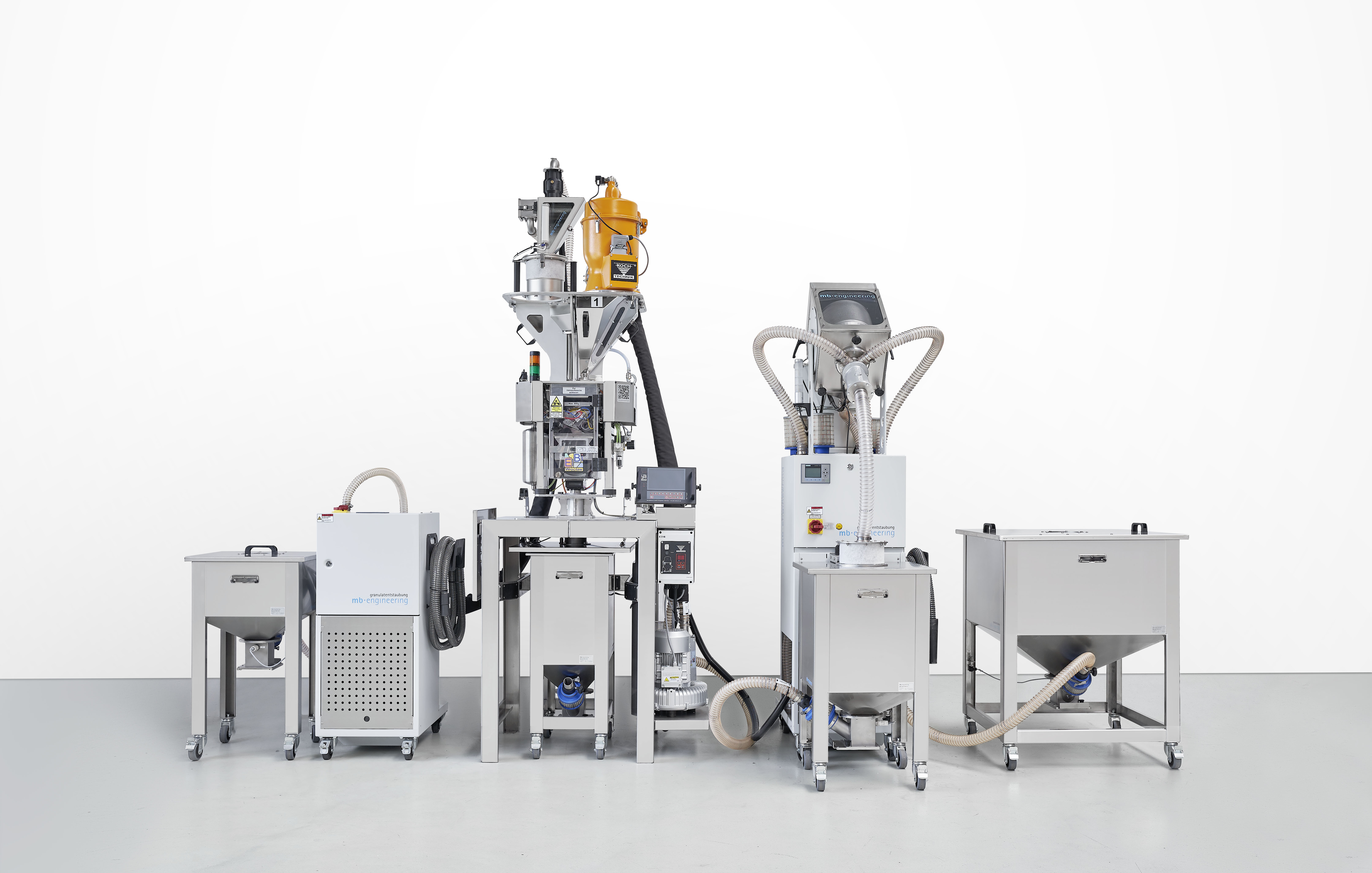 Full material processing: A dosing unit is filled with a TS5 granulate deduster (virgin material) and a TS20 granulate deduster (ground material) and the granulate is dispensed into a mobile INOX silo.